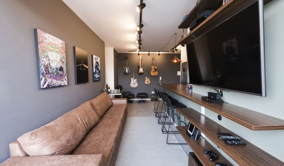 Estilo industrial e o mundo da música se fundem em um apartamento de 45 m²